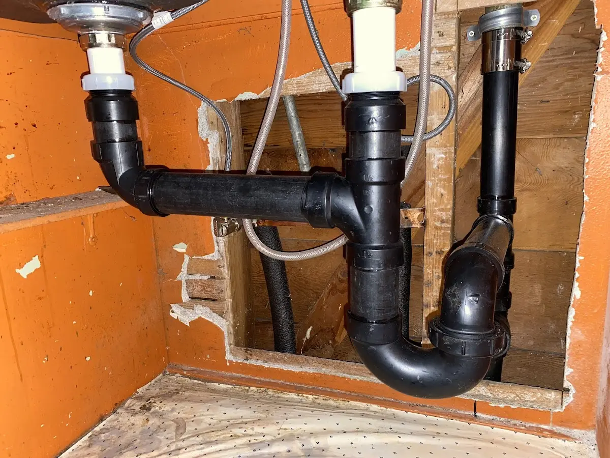 Professional Garbage Disposal Repair equipment and tools on the job in Kendall